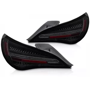 LED tuning tail light kit suitable for Mercedes CLA C117 2013-2016 with black smoked base and dynamic turn signal, for the model equipped with halogen tail lights, left and right