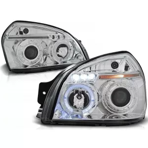 Tuning headlight set suitable for Hyundai Tucson 07.2004-2010 with chrome base, left and right