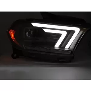 Set di fari tuning con indicatori di direzione dinamici adatto per Dodge Durango 2010-2013 con base nera-image-6238378